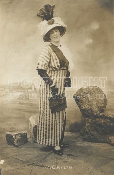 Will Catlin in drag, feathered hat