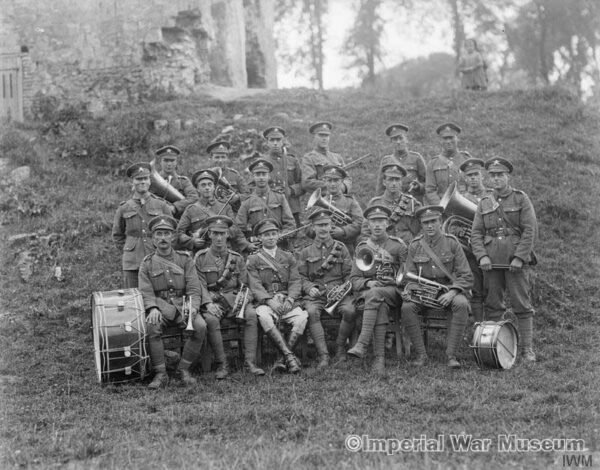 The regimental band of the 39th Battalion, Machine Gun Corps at Rombly, 20 July 1918. - IWM archives