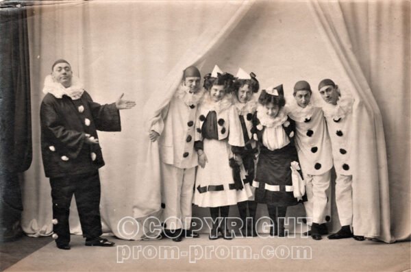 'The_Follies' HG_Pelissier_standing_on_the_left_in_dark_costume